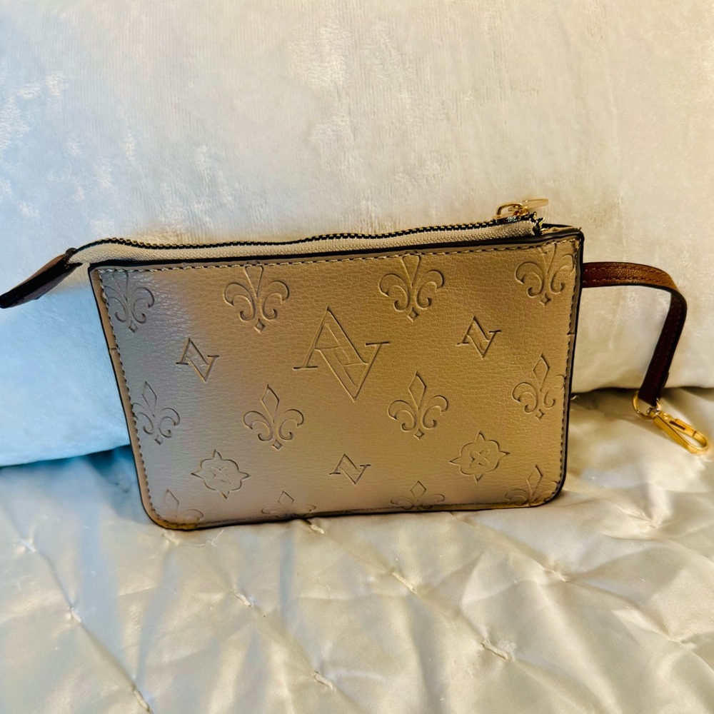 Tan Wristlet With Embossed Pattern - image 1